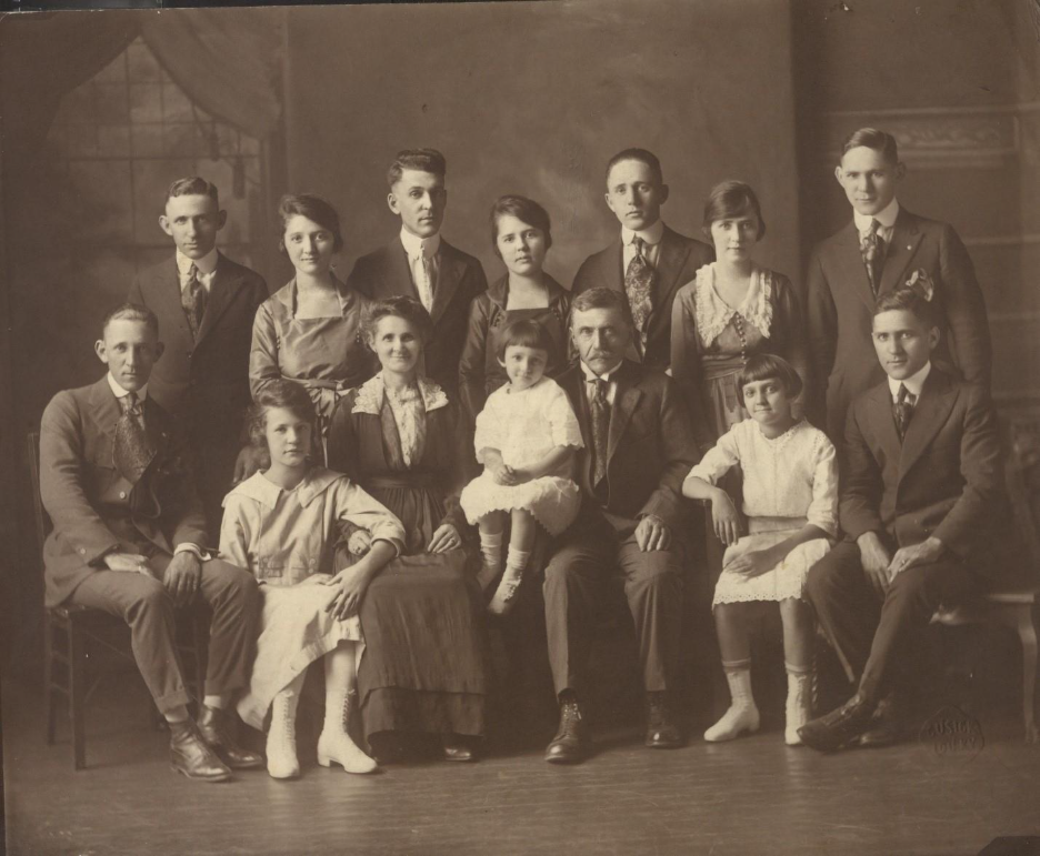 A group of people posing for a photo AI-generated content may be incorrect_